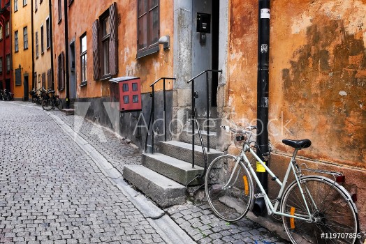 Picture of Sweden Stockholm quaint cobblestone street in historic district Gamla Stan Parked bike